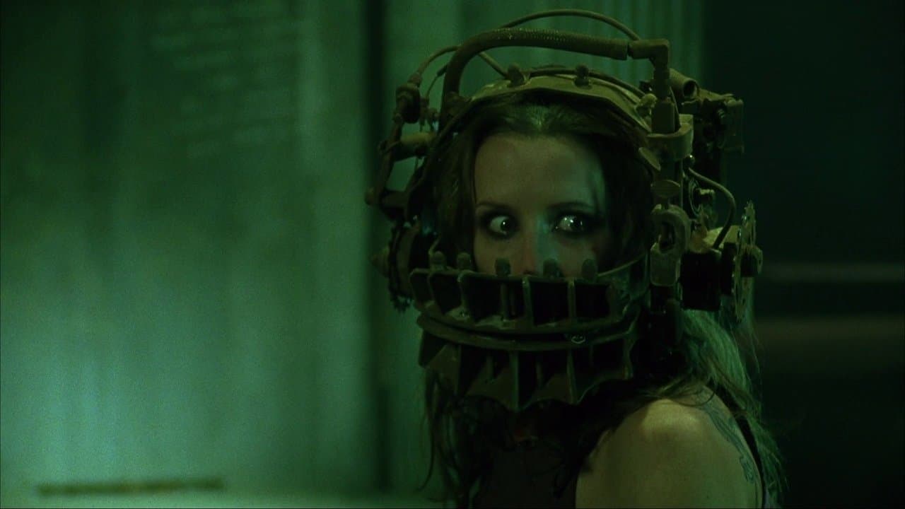 Amanda Young presa à Armadilha de Urso Reversa em Jogos Mortais (2004)